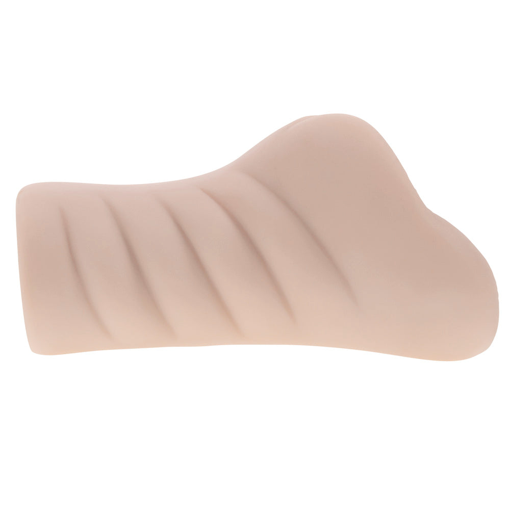 A flesh-toned dual entry stroker with ribbed texture.