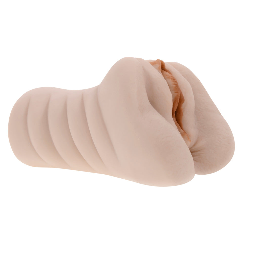 Sasha Grey dual-entry stroker in waterproof canister, flesh-colored TPR with vaginal and anal openings.