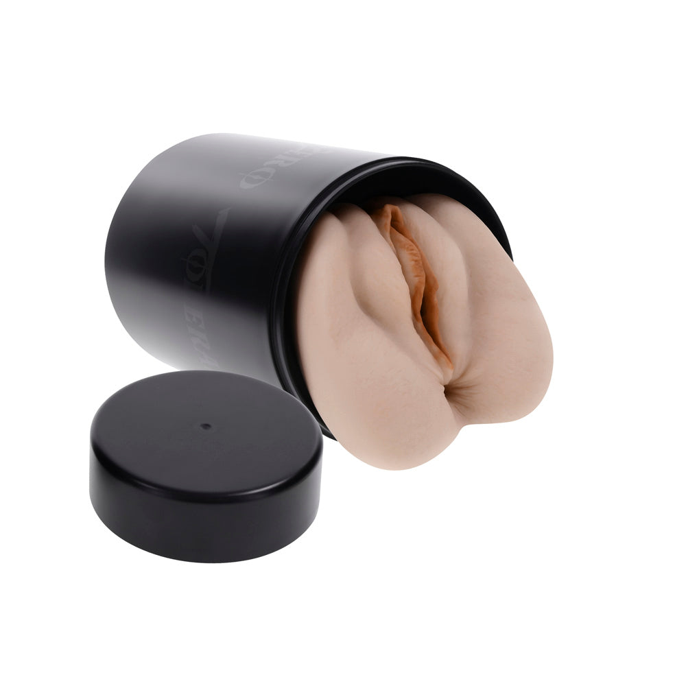 Black canister with a realistic flesh-toned stroker partially visible inside.