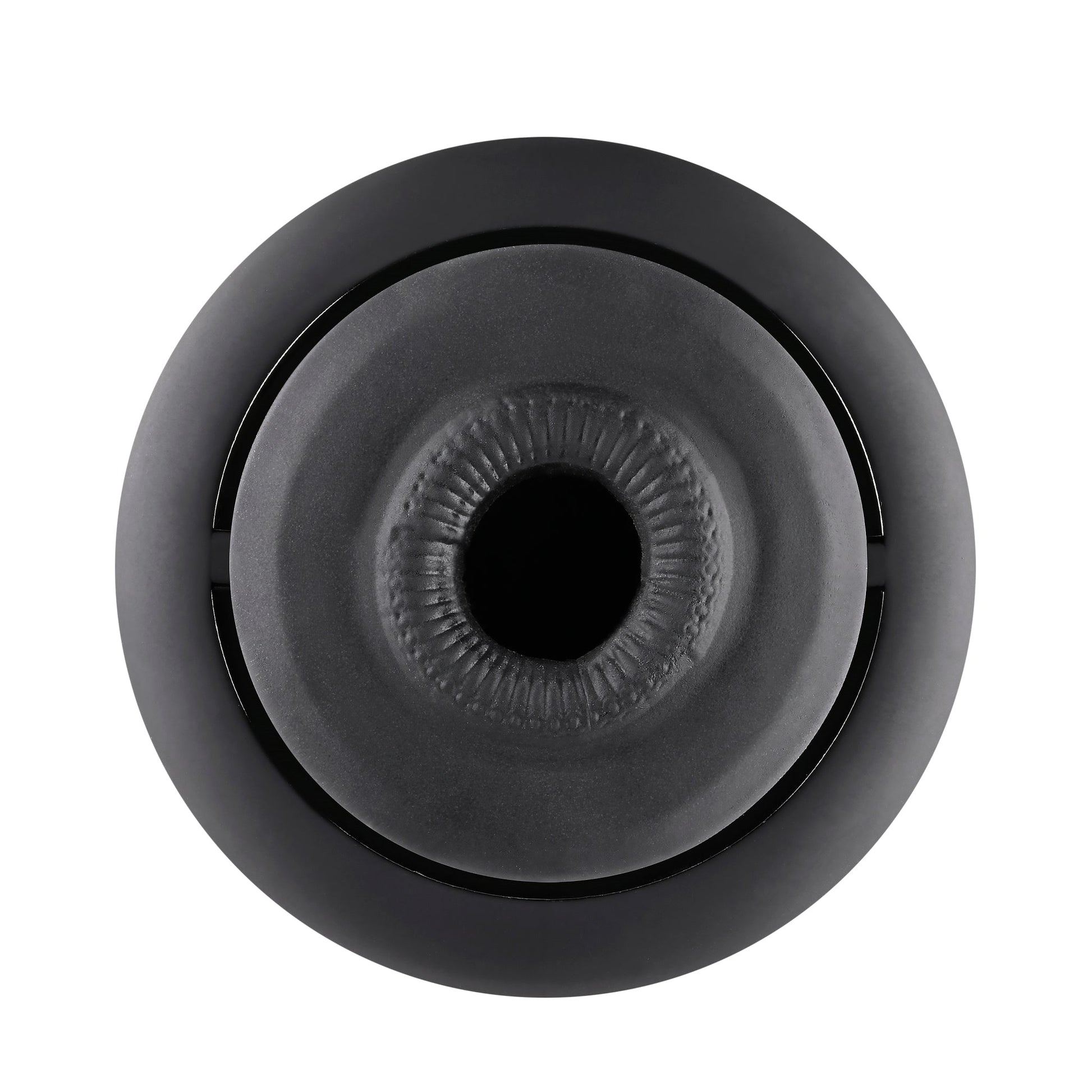 Black silicone stroker with textured inner ball and outer ring.