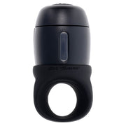 A black vibrating stroker with a lube dispenser and the Zero Tolerance logo.