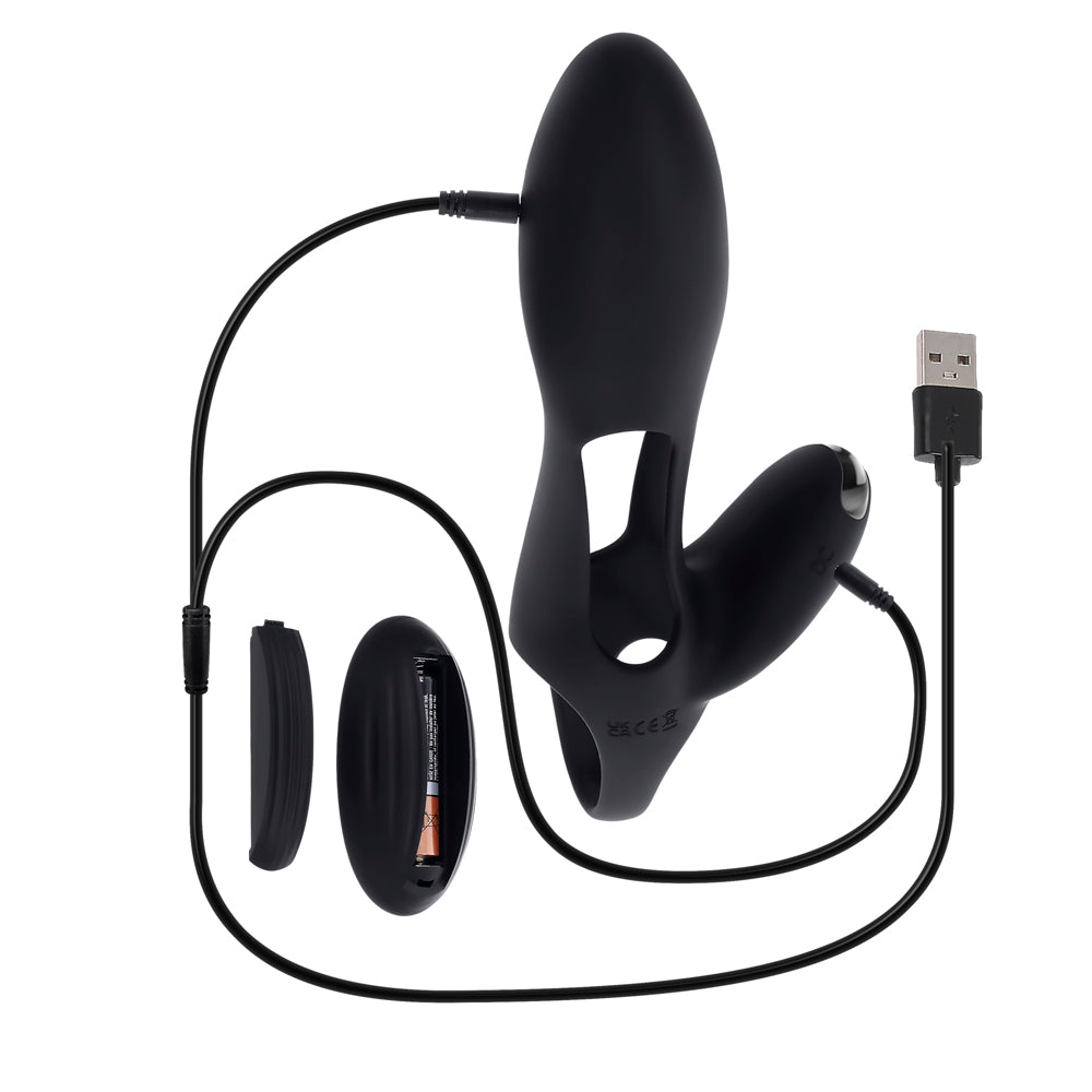 Black vibrating sleeve with USB charging cable and battery compartment.