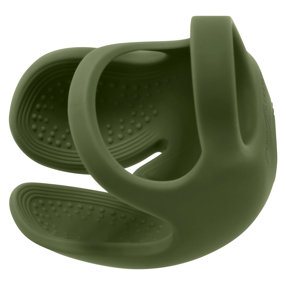 A green silicone ball ring with textured inner surfaces and a handle.