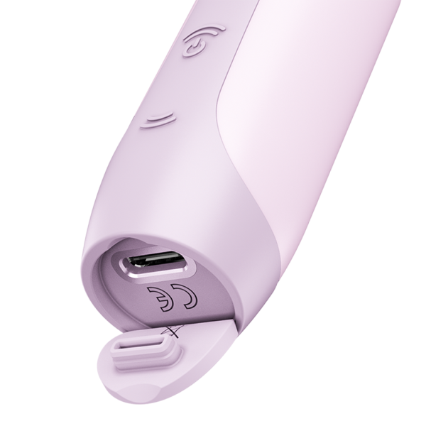 Close-up of a pink vibrator with a USB-C charging port and CE marking.