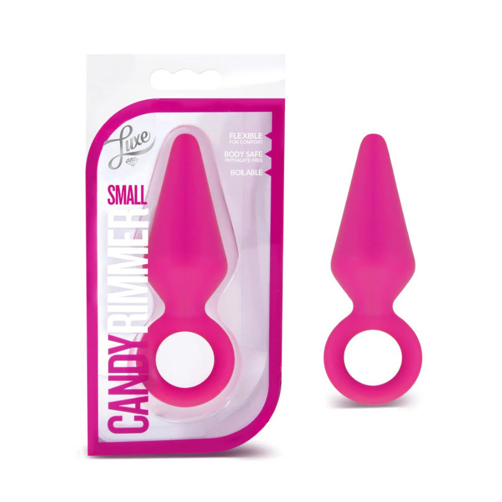 Pink silicone anal plug with a pull ring.