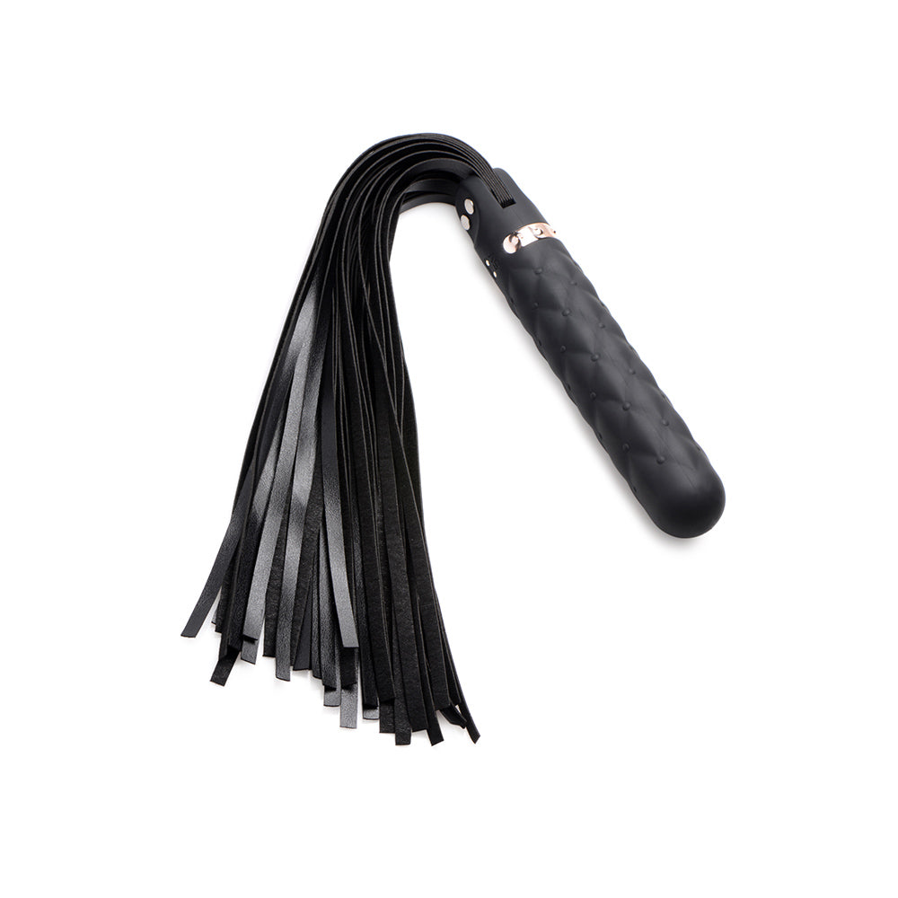 Black silicone flogger with a textured handle and multiple leather straps.