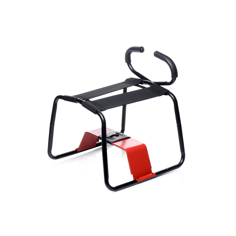 A black metal bench with red supports and black handles.