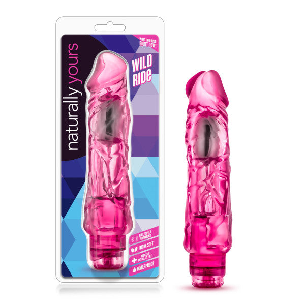 Pink realistic waterproof vibrator with textured shaft in packaging.