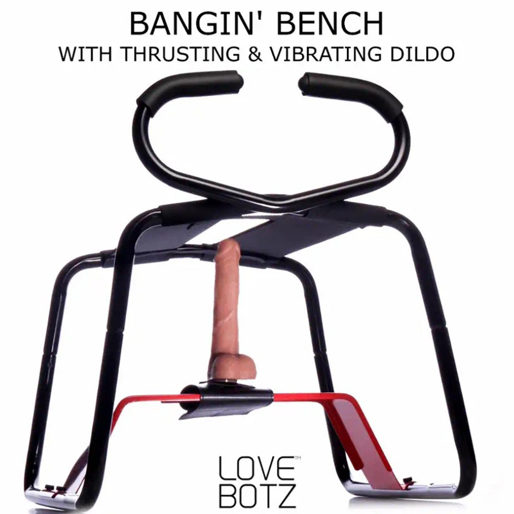 A black bench with a vibrating and thrusting dildo attached.