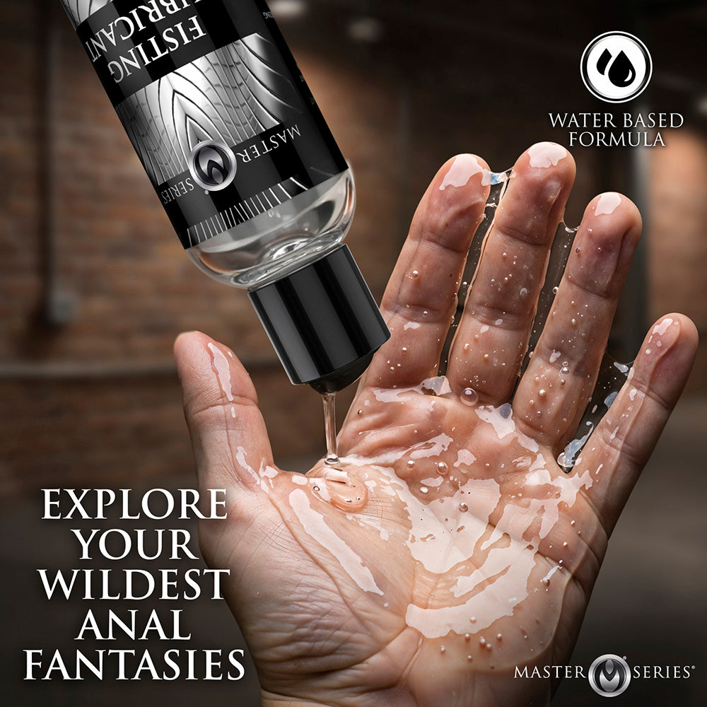 A hand is being lubricated with a clear, water-based formula from a bottle labeled "Master Series".