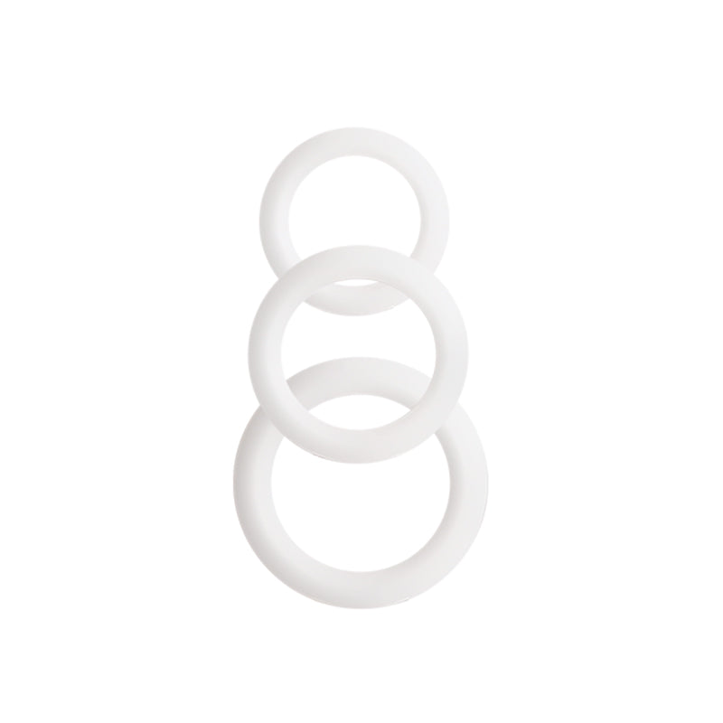 Three white silicone rings of varying sizes stacked vertically.