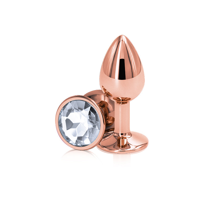 Small rose gold aluminum anal plug with a clear gem.