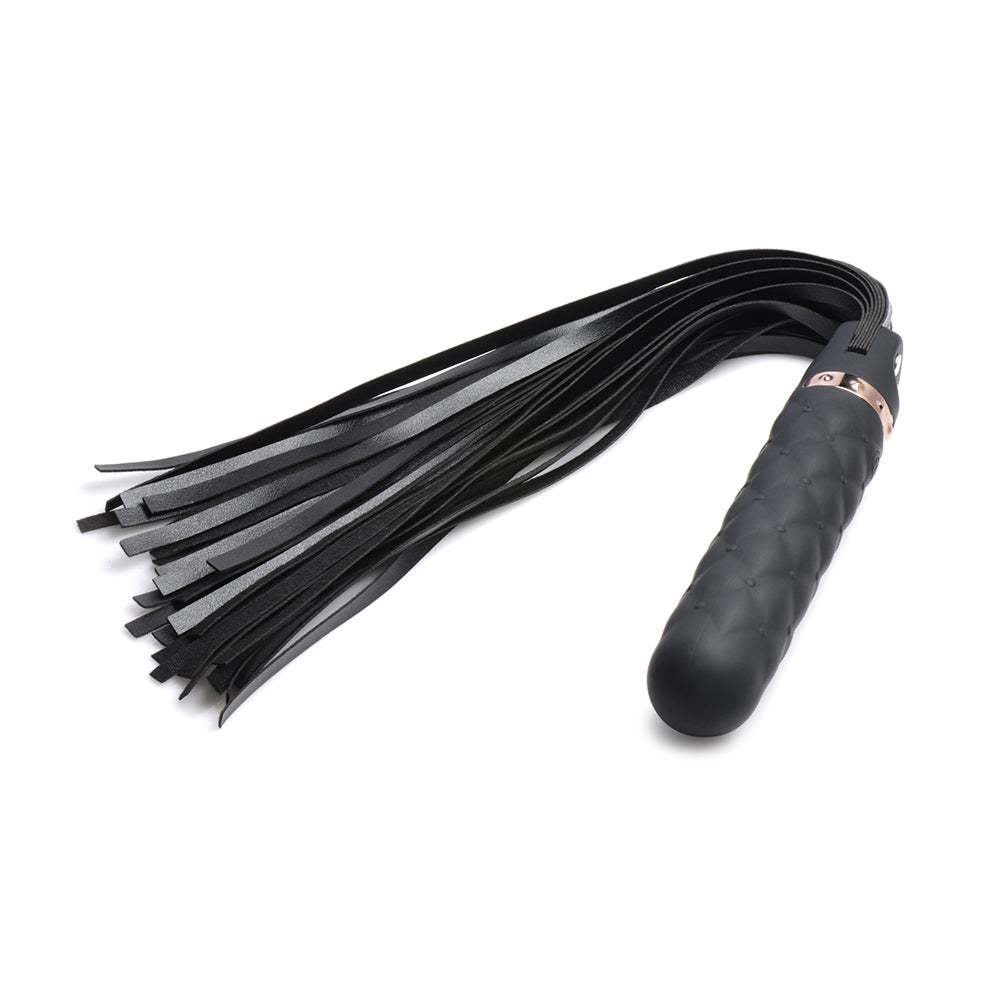 Black silicone dildo flogger with textured handle and leather straps.