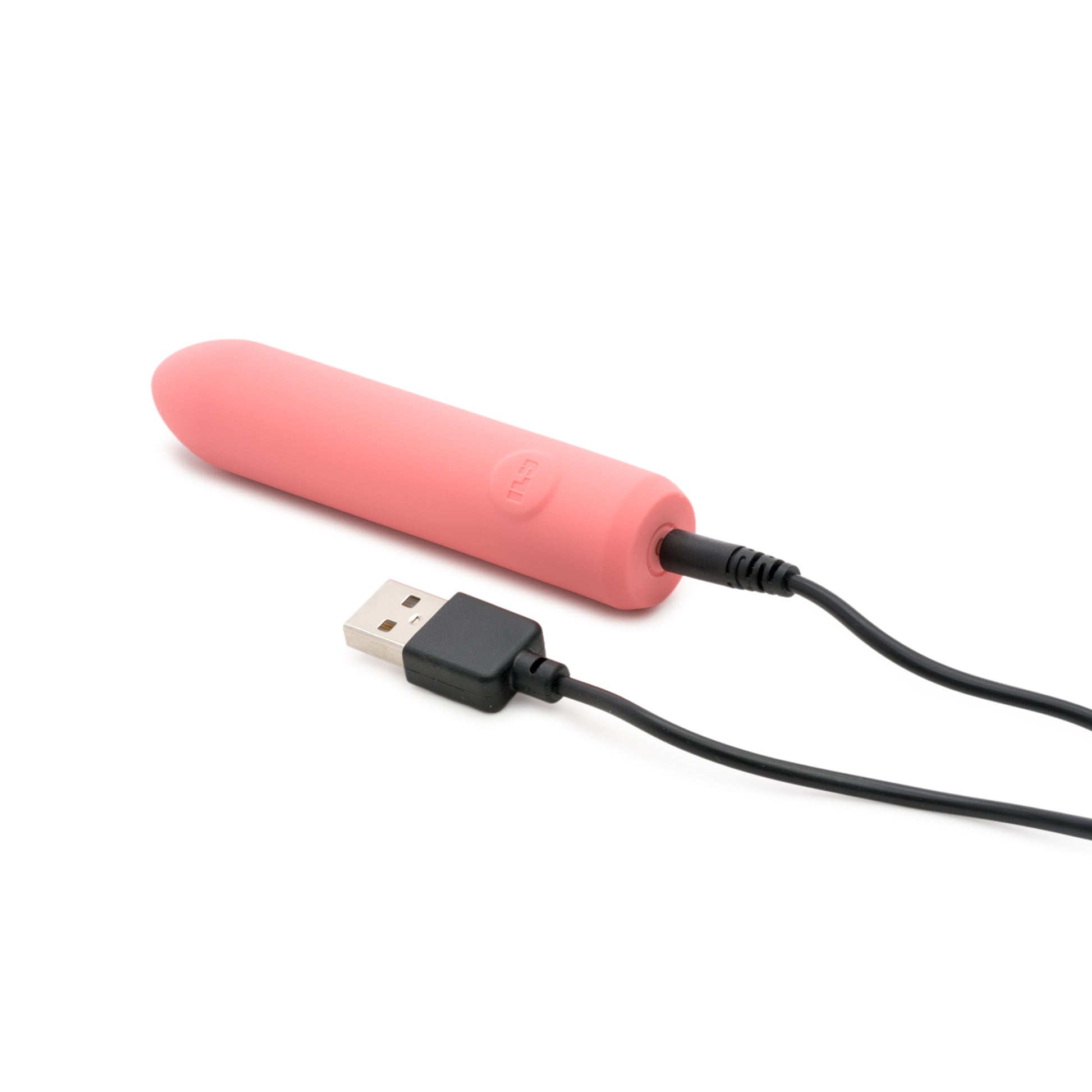 A pink rechargeable vibrator with a USB charging cable.