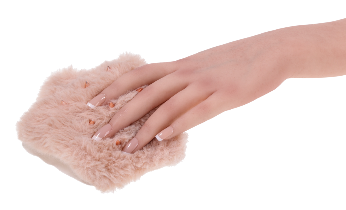 A hand with French manicured nails touches a pink faux fur glove with rose gold spikes.