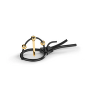 Black corona strap with gold urethral sound and gold balls.