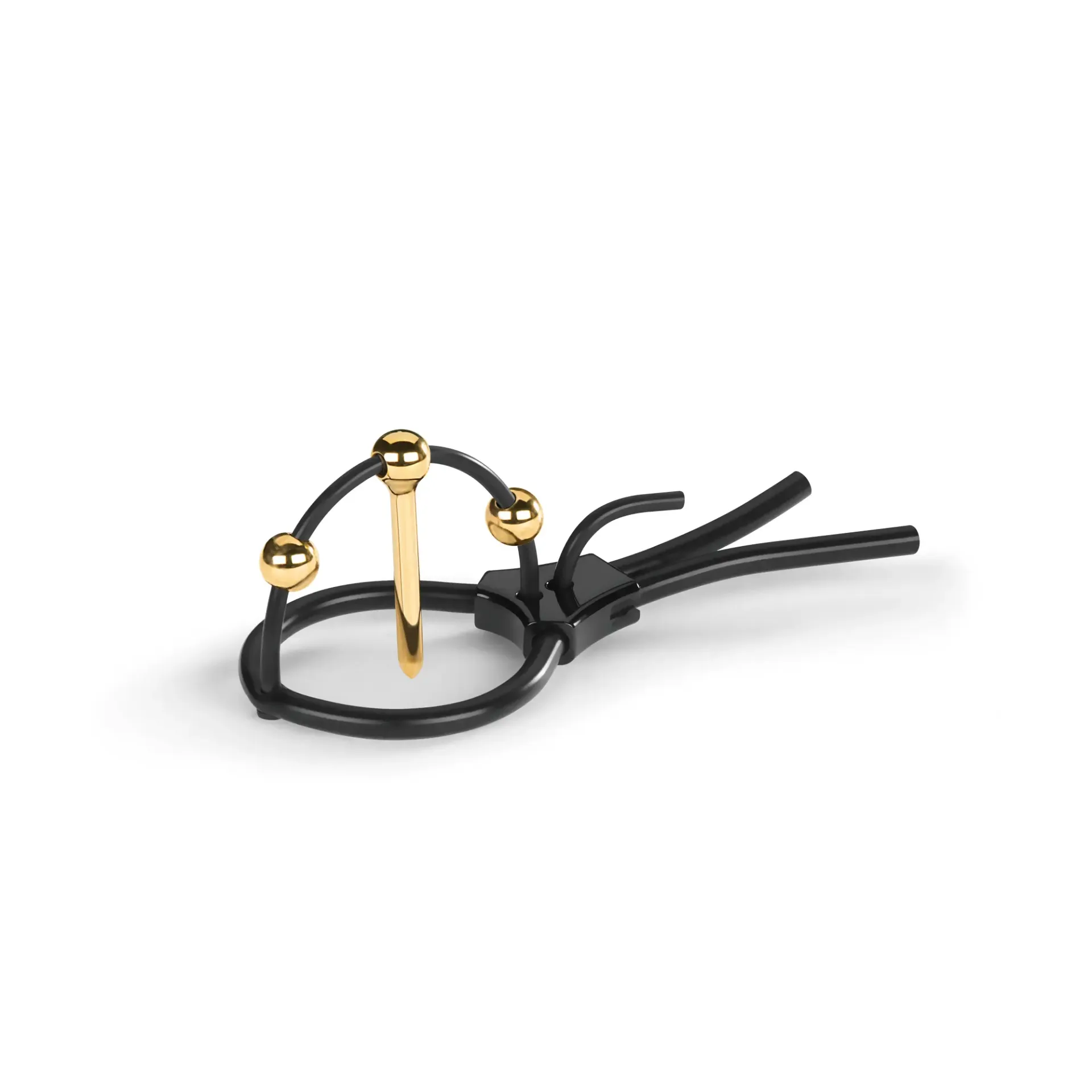 Black corona strap with gold urethral sound and gold balls.
