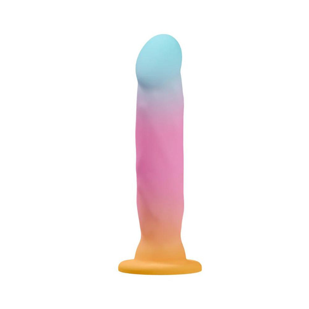 A silicone stimulator with a gradient of blue, pink, and orange, and a flared base.