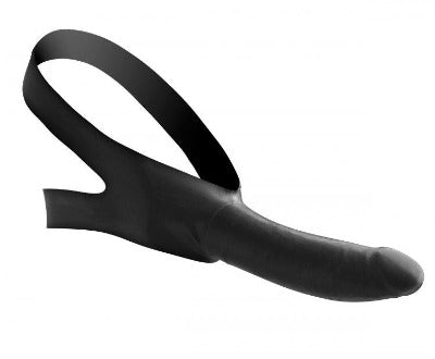 Black latex face harness with a black dildo.