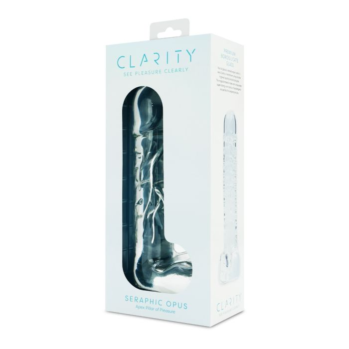 A clear glass dildo with a curved tip is displayed in its packaging.