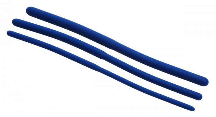 Three blue silicone urethral sound trainers of graduated sizes.