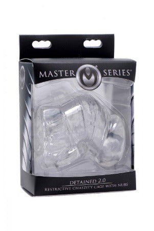 Clear TPR chastity cage with nubs in packaging.