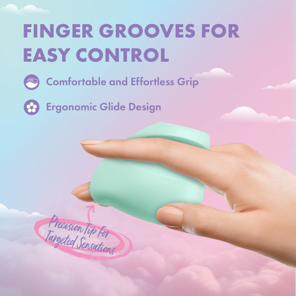 A hand holds a mint green vibrator with finger grooves for easy control.
