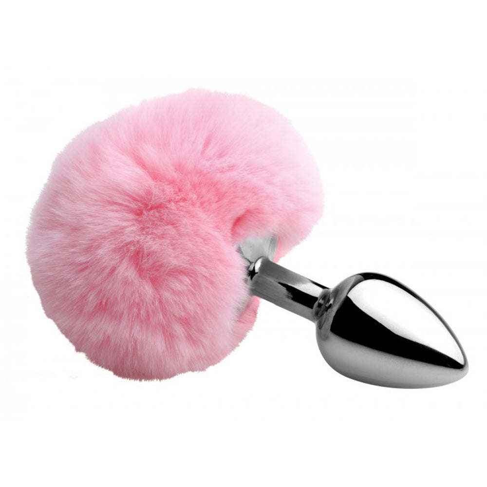 Pink fluffy bunny tail anal plug with a tapered metal base.