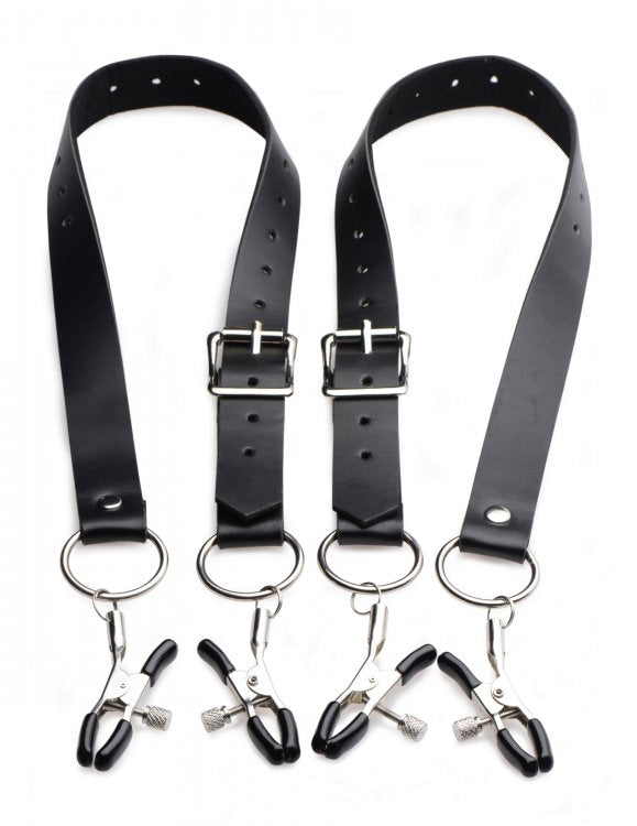 Black adjustable straps with metal clamps and rings.