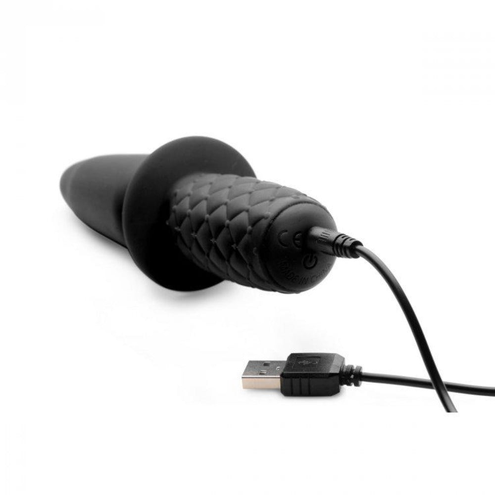 Black silicone vibrating anal thruster with USB charging cable.