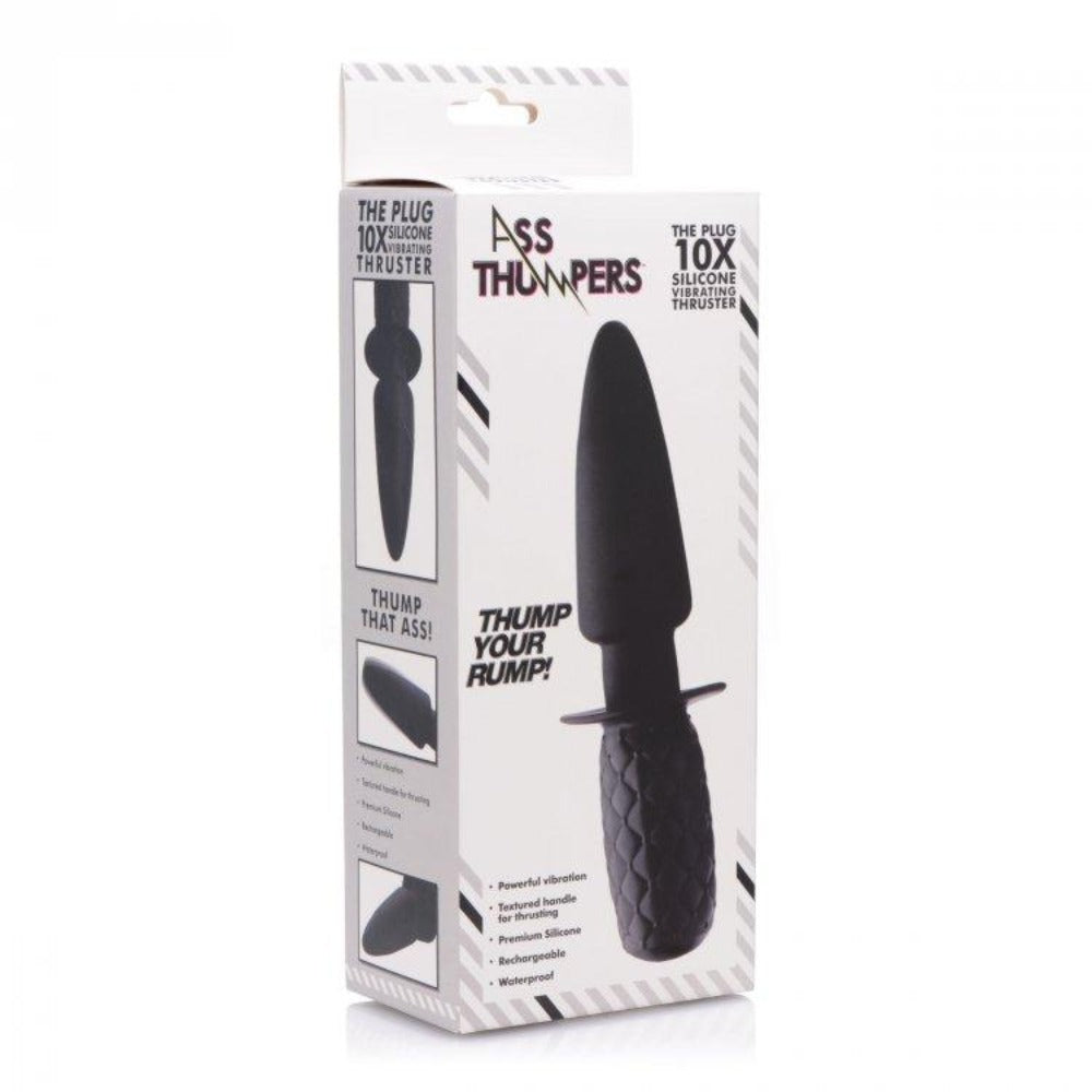 Black silicone vibrating anal thruster with textured handle on packaging.