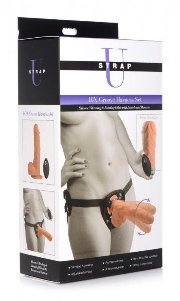 A rotating vibrating strap-on kit with a harness and remote.