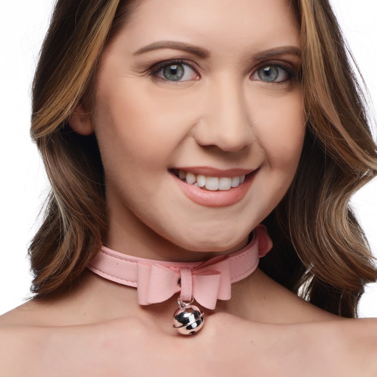 Pink PU leather cat collar with a bow and bell.