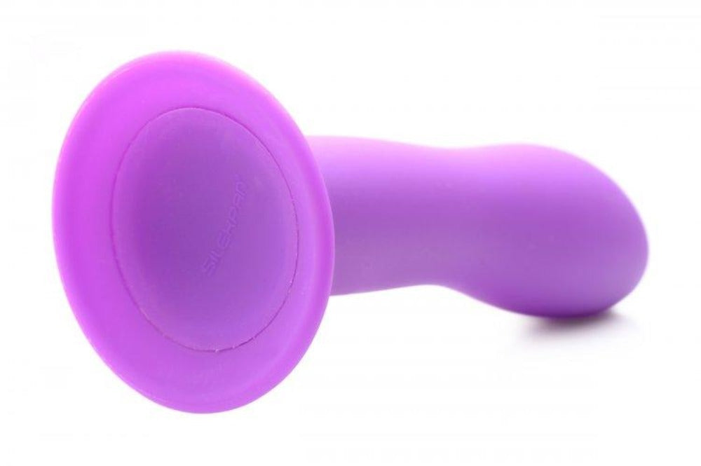 Purple silicone dildo with a suction cup base.