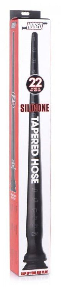 A black, 22-inch tapered silicone anal hose with inch markers and a suction cup base.