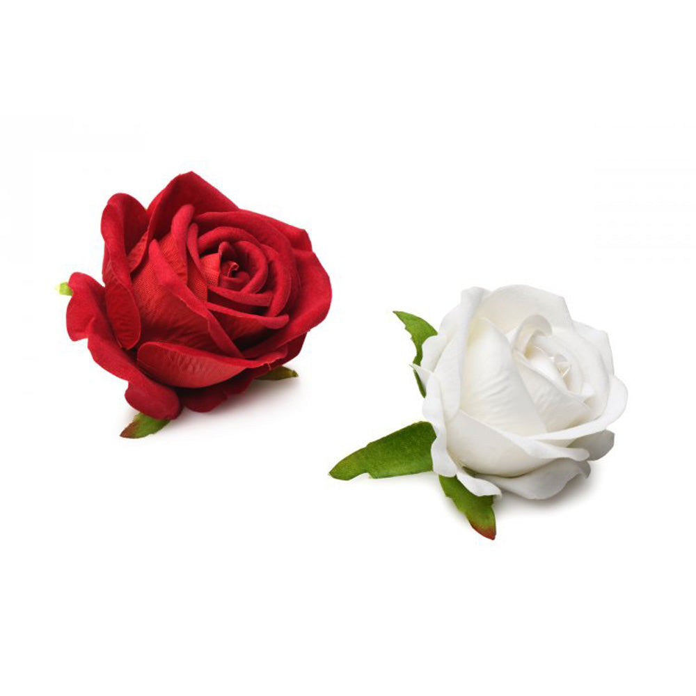 Two faux roses, one red and one white, on a white background.