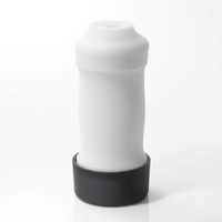 White textured male masturbator with a black base.