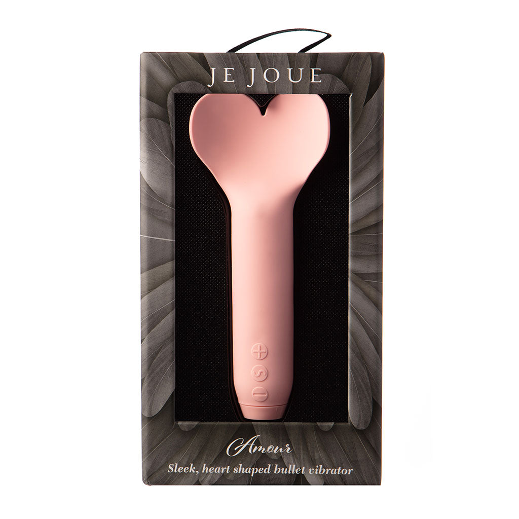 A pink, heart-shaped bullet vibrator with a sleek design and control buttons.