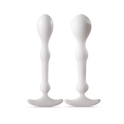 Two white anal swizzle sticks with flared bases and bulbous tips.