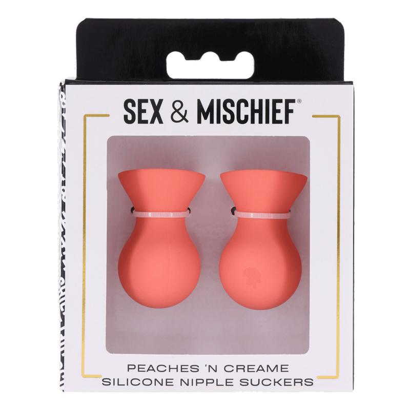 Two peach colored silicone nipple suckers with white bands.