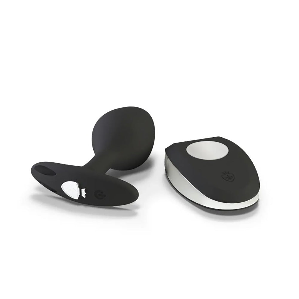 Black vibrating prostate butt plug with a remote control.