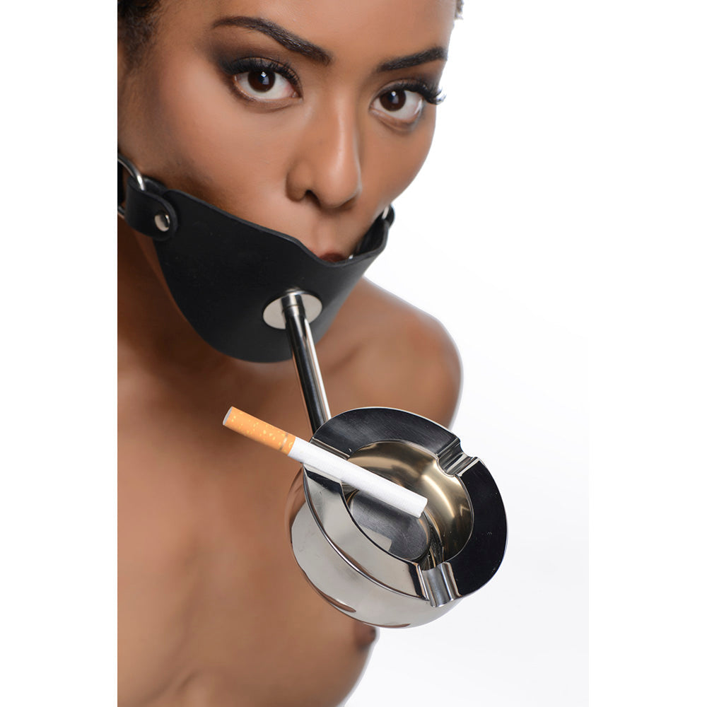 Leather ball gag with a detachable stainless steel ashtray and cigarette.