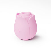 Pink rose-shaped silicone vibrator with a water droplet symbol.