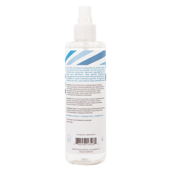 A clear spray bottle with blue and white stripes on the label.