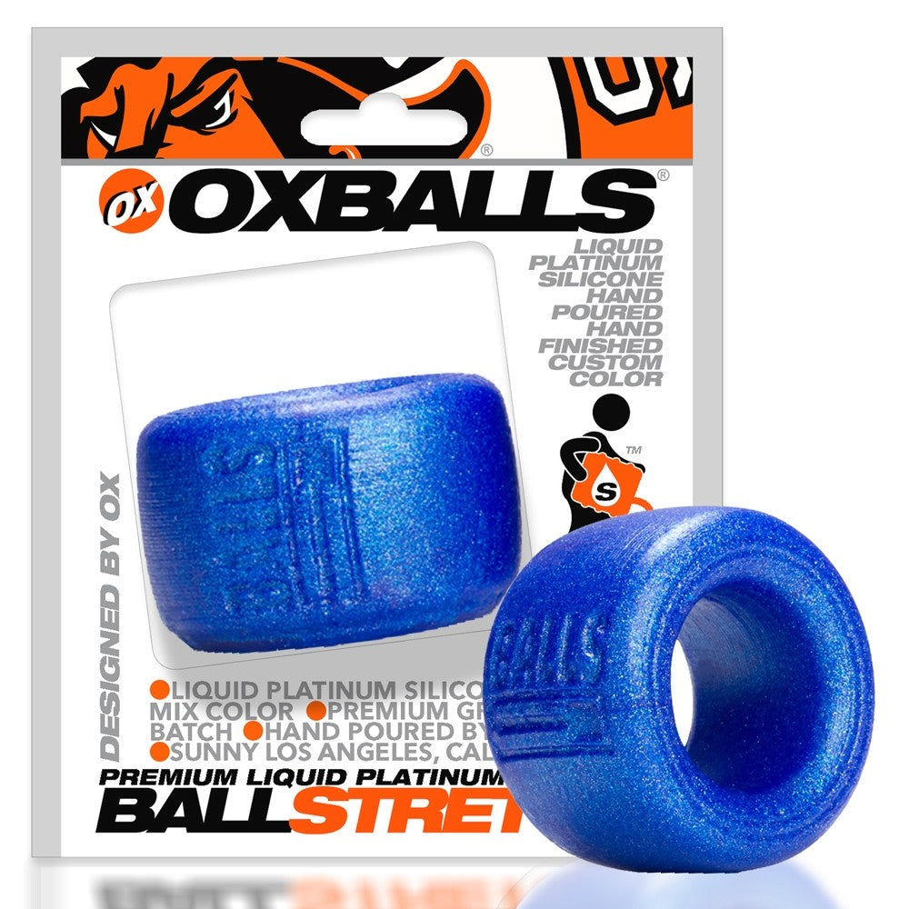 Metallic blue silicone ball stretcher ring with Oxballs branding.