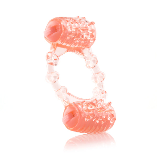 A pink dual-motor vibrating pleasure ring with textured ticklers.