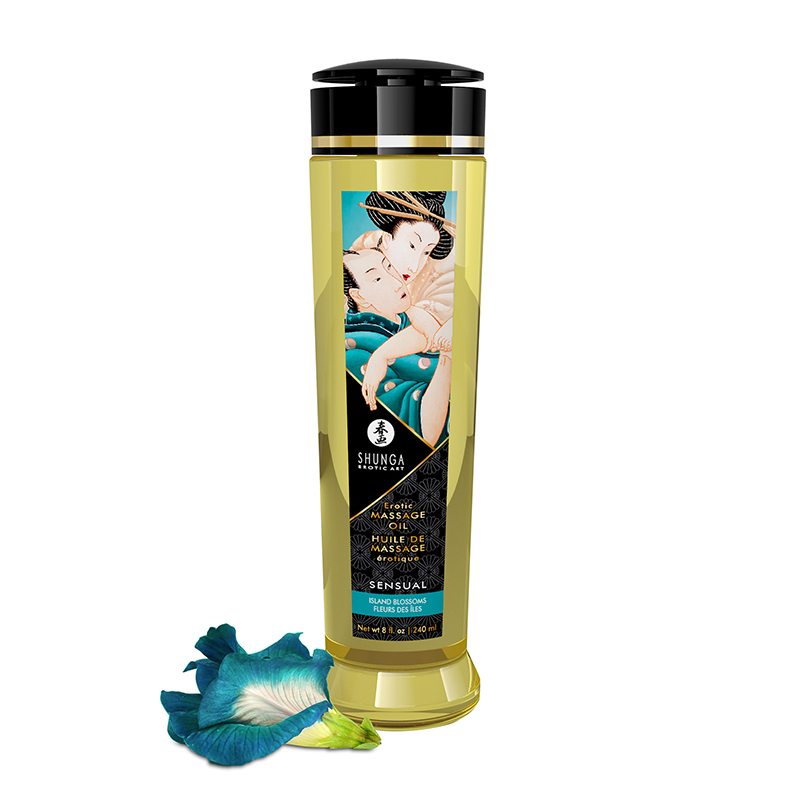 Bottle of Shunga Island Blossom Sensual Massage Oil with a blue flower petal.