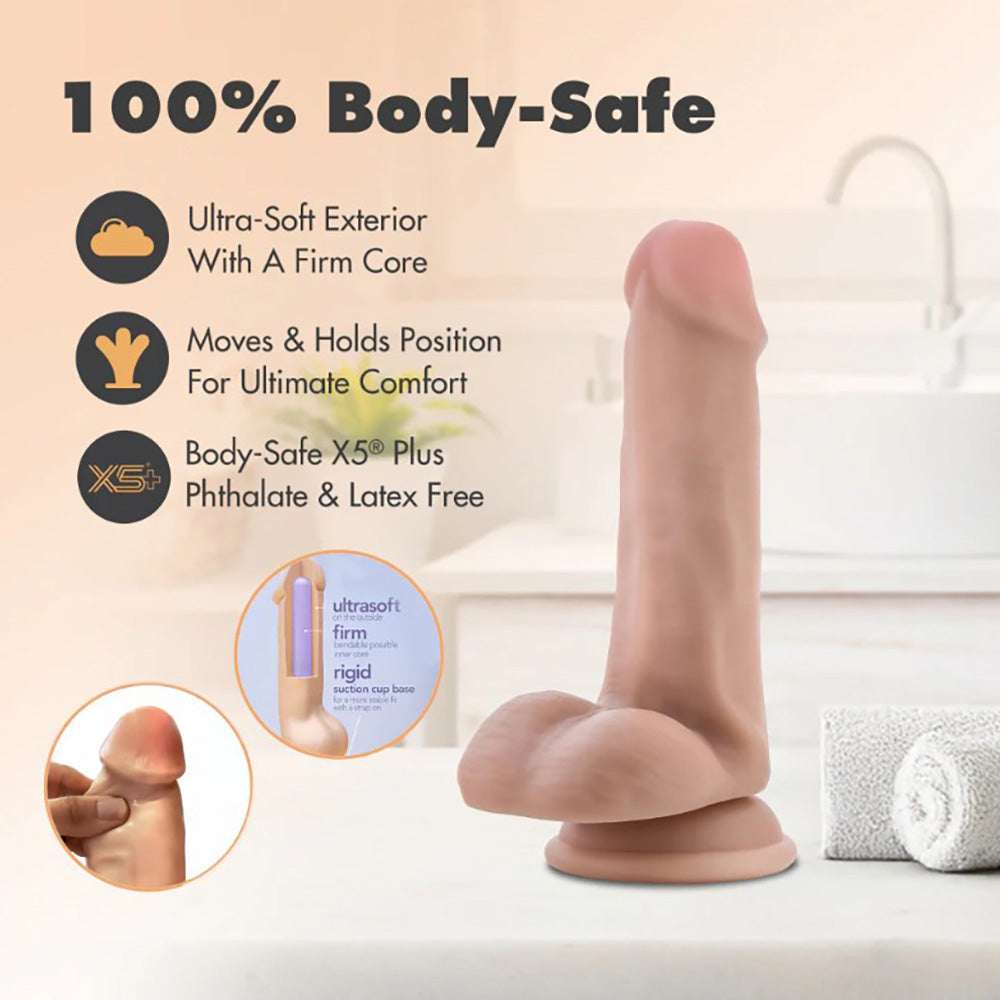 Posable triple density TPE dildo with suction cup base, shown in flesh tone.