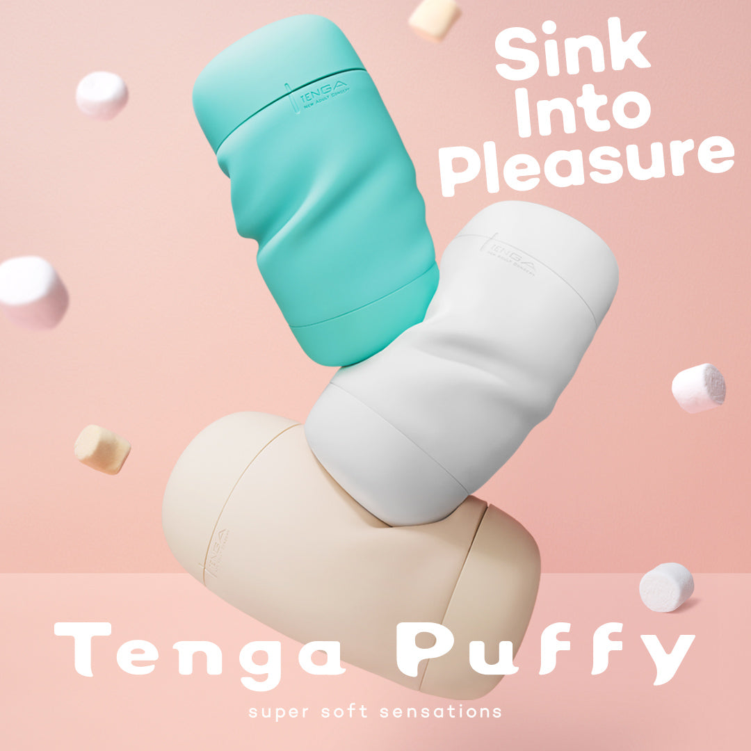 Three Tenga Puffy Soft Strokers in teal, white, and beige, with marshmallows.