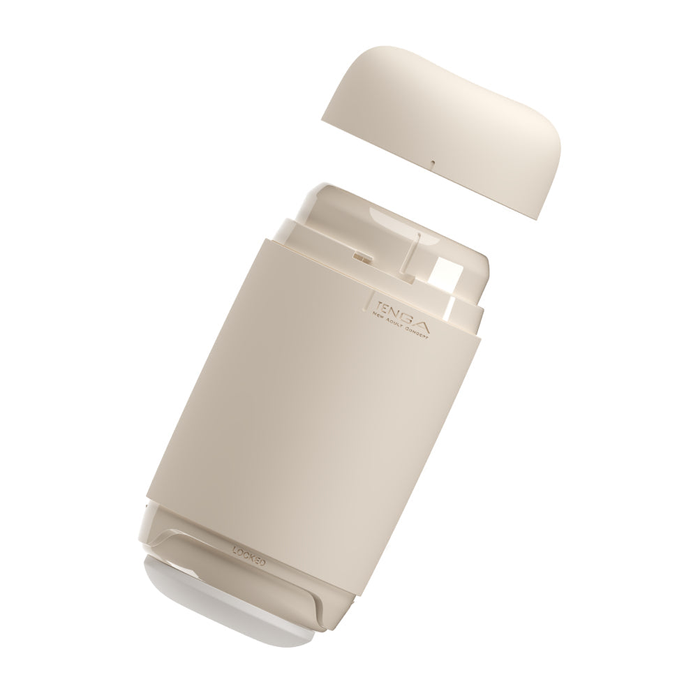 A beige Tenga Puffy Soft Stroker with its cap open.